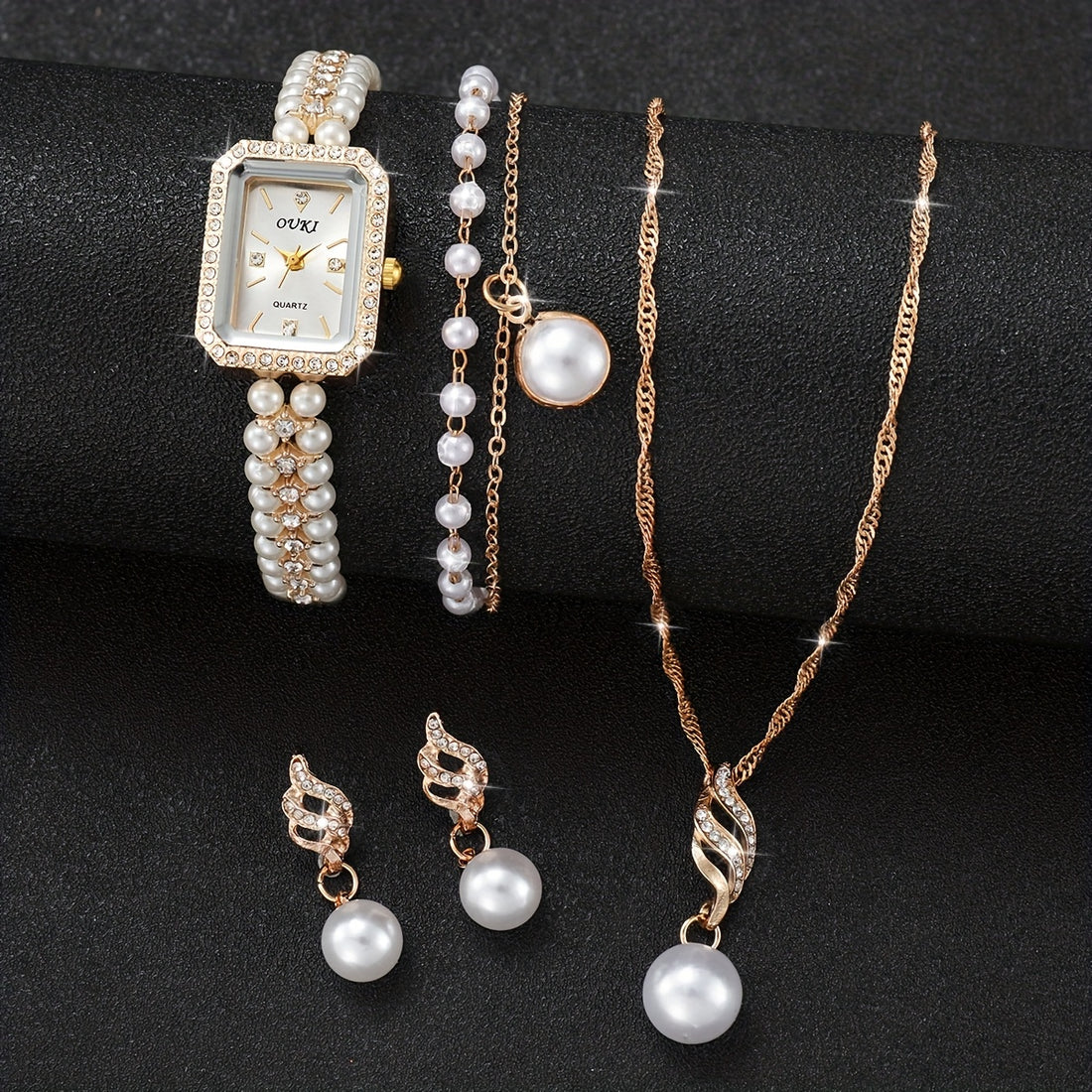 Relógio Feminino Dourado Pérolas — detalhe 2 das peças do conjunto