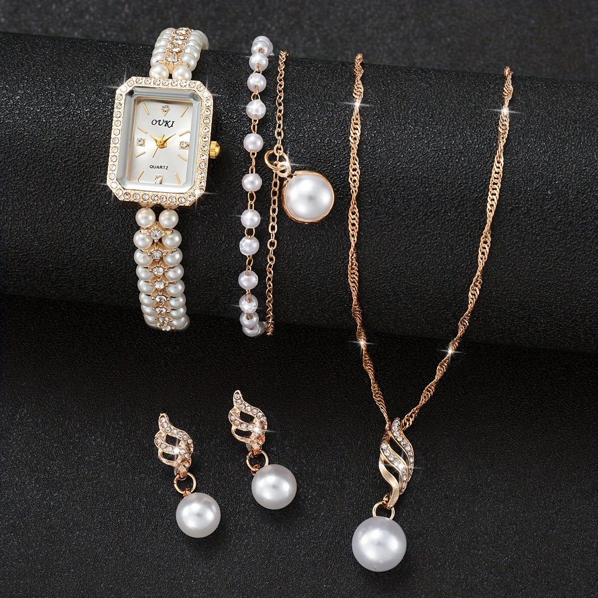 Relógio Feminino Dourado Pérolas — detalhe 2 das peças do conjunto