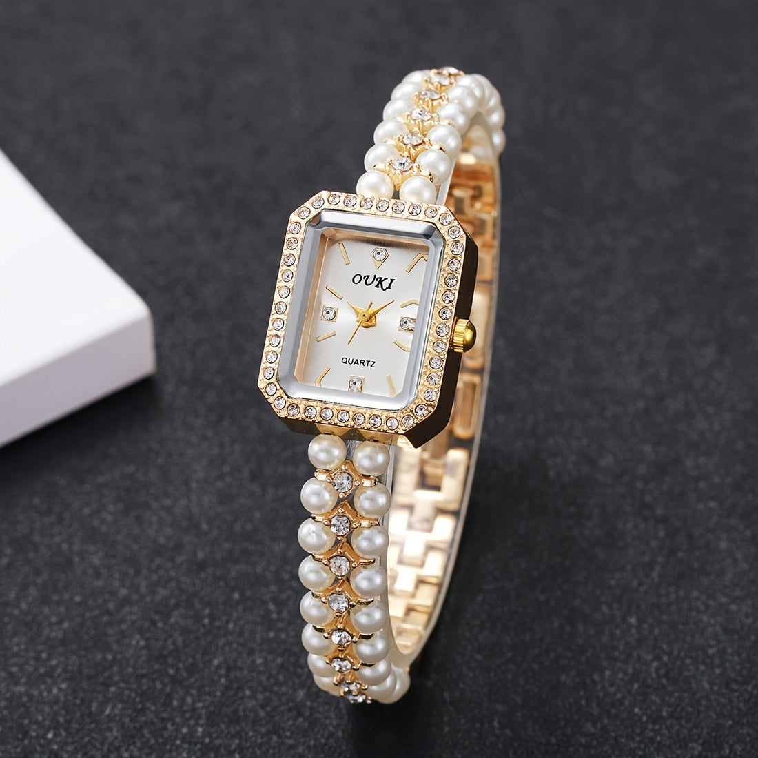 Relógio Feminino Dourado Pérolas — detalhe 8 das peças do conjunto