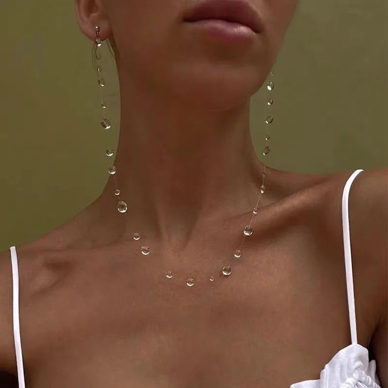Conjunto de Colar e Brincos Gota d’Água – Design Minimalista e Elegante para Mulheres